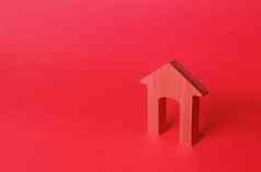 红色的拱房子小雕像负担得起的住房租金真正的房地产修复改造现代化极简主义红色的登录背景概念入口房地产经纪人服务