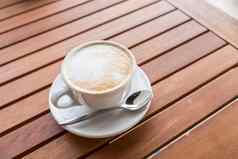 陶瓷杯咖啡表格咖啡商店咖啡馆咖啡杯拿铁艺术咖啡馆木表格经典咖啡杯意大利卡布奇诺咖啡美味的早....热喝