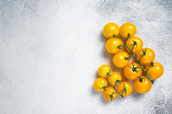 小黄色的樱桃番茄厨房表格白色背景前视图复制空间