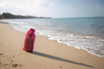 网购物袋水果站桑迪海滩海阳光明媚的一天生态海洋概念