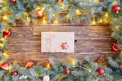 木背景冷杉分支机构假期礼物圣诞节卡前视图