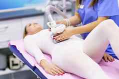 女人特殊的西装反脂肪团肚子按摩水疗中心装置