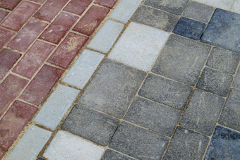 混凝土铺新铺设灰色的红色的铺平道路板石头地板人行道混凝土铺平道路板后院路铺平道路花园砖路径院子里桑迪基金会