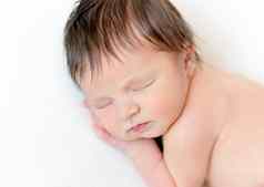 甜蜜的新生儿婴儿睡觉白色毯子