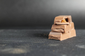 国家牛奶巧克力一天股票图片桩巧克力坚果图片巧克力孤立的棕色（的）背景牛奶巧克力一天海报7月重要的一天
