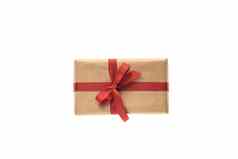 圣诞节作文礼品盒包装工艺纸红色的丝带孤立的白色背景圣诞节冬天一年庆祝活动概念平躺前视图复制空间