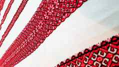 乌克兰人手刺绣绣花点缀红黑线程白色织物绣花点缀黑色的红色的线程少数民族乌克兰人刺绣白色织物