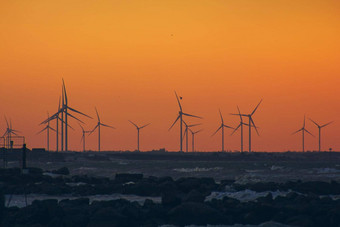 风涡轮权力<strong>发电机</strong>轮廓海洋海岸线日落替代<strong>可</strong>再生能源生产