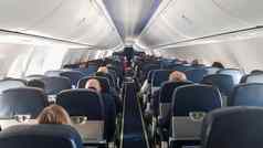 乘客等待离开俄罗斯航空公司飞行波音公司飞机洲际飞行游客旅行飞机拍摄内部飞机