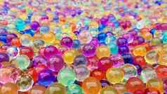 很多彩色的水凝胶球集五彩缤纷的奥比斯水晶水珠子游戏氦气球背景聚合物过来这里硅过来这里