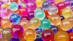 很多彩色的水凝胶球集五彩缤纷的奥比斯水晶水珠子游戏氦气球背景聚合物过来这里硅过来这里