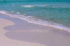 沙子海滩蓝色的海洋Cloudscape背景海洋蓝色的背景