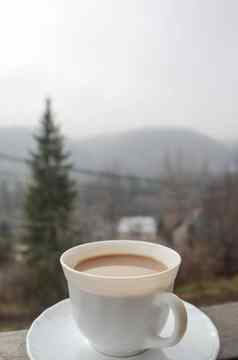 白色杯咖啡摘要自然背景咖啡杯子阳台视图自然陶瓷杯喝酒店阳台