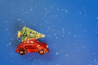 圣诞节车树屋顶蓝色的背景
