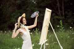 漂亮的女人艺术家油漆图片自然景观