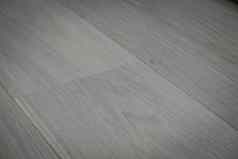 灰色的地板上木条镶花之地板纹理背景