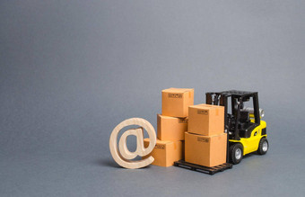 黄色的叉车卡车纸板盒子电子邮件象征商业电子商务销售货物在线交易平台购物在线发展互联网网络贸易