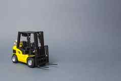 黄色的叉车卡车灰色的背景仓库设备车辆物流运输基础设施行业农业卸货运输排序加载货物