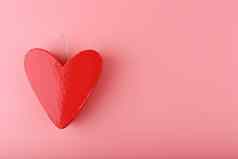 心形状的红色的礼物盒子粉红色的背景复制空间概念情人节一天礼物