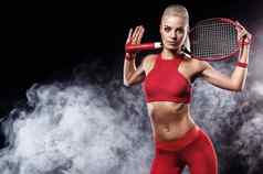美丽的金发女郎体育运动女人网球球员球拍红色的服装