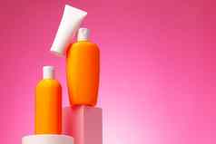 护肤品美产品容器粉红色的背景