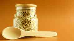 绿色豆芽生有机荞麦玻璃麦片Jar木勺子素食主义者食物概念有机食物概念饮食重量损失健康的适当的营养复制空间文本