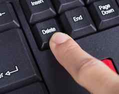 手指推删除按钮键盘电脑