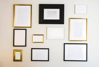 空黄金黑色的<strong>照片图片</strong>帧白色墙模拟照片文本复制空间现代设计奢侈品装饰