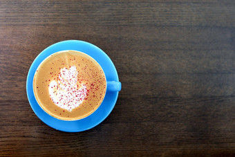 大咖啡杯牛奶木表格卡布奇诺咖啡拿铁喝杯咖啡棕色（的）表格平躺视图杯咖啡馆牛奶牛奶绘画热咖啡蓝色的杯子