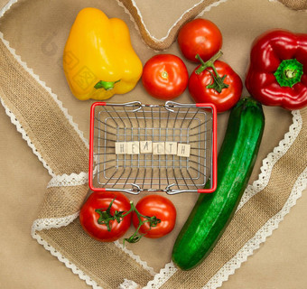 新鲜的有机蔬菜词健康购物篮子包围丝带心棕色（的）工艺纸前视图健康素食主义者vegetarion概念