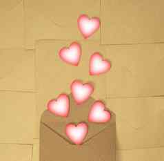纸工艺信封粉红色的心棕色（的）平原背景概念爱情人节一天前视图复制空间