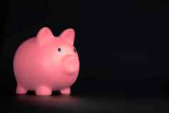 粉红色的小猪银行水平黑色的背景复制空间业务储蓄金融概念