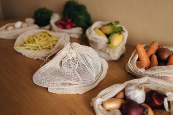 蔬菜可重用的生态棉花袋木表格浪费<strong>购物</strong>概念帆布杂货店袋西红柿胡萝卜土豆塑料<strong>免费</strong>的项目