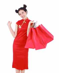 女人持有购物袋中国人一年庆祝活动孤立的白色背景