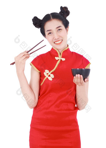 快乐女人穿中国人旗袍衣服筷子碗孤立的白色背景