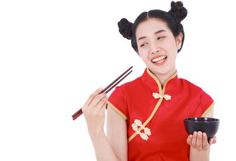 快乐女人穿中国人旗袍衣服筷子碗孤立的白色背景