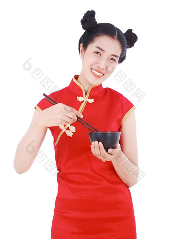 快乐女人穿中国人旗袍衣服筷子碗孤立的白色背景