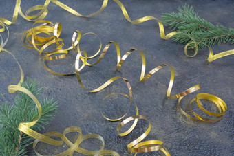 圣诞节作文冷杉分支机构黄金丝带黑色的石油黄金压花背景