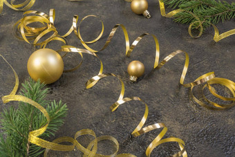 圣诞节作文黄色的圣诞节球冷杉分支机构黄金丝带黑色的黄金压花背景
