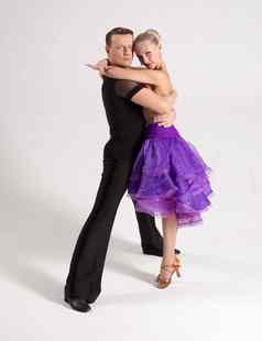 跳舞萨尔萨舞夫妇背景时尚体育运动华尔兹人漂亮的桑巴现代美丽的表达式衣服高加索人舞者