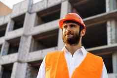 构建器穿需要戴安全帽的安全背心站商业建设网站