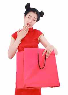 惊讶女人开放红色的购物袋概念快乐中国人一年孤立的白色背景