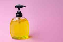 瓶液体肥皂手洗手液粉红色的背景