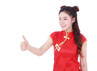 女人穿红色的<strong>旗袍</strong>拇指概念快乐中国人一年孤立的白色背景