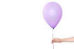 女士手持有紫色的气球白色背景
