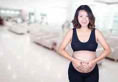 怀孕了女人持有手心形状肚子医院