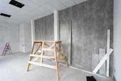 修复公寓建筑画家的山羊室内明亮的房间新鲜的贴墙白色墙建筑建设房子