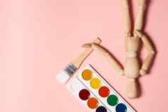绘画工具刷水彩绘画工具粉红色的背景