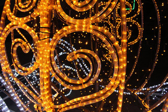 黄色的灯黑暗黑色的背景一年的夏娃圣诞节背景节日照明