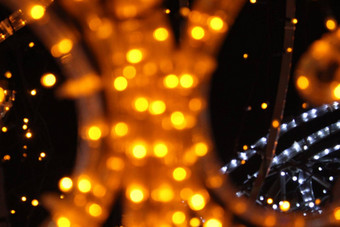 黄色的灯黑暗黑色的背景一年的夏娃圣诞节背景节日照明
